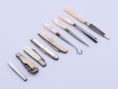 A quantity of mother-of-pearl fruit knives, etc. Largest knife 7 cm long closed.