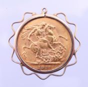 A 1911 gold sovereign mounted as a pendant on a 9 ct gold chain.