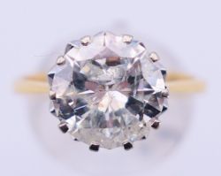 An 18 ct gold and diamond solitaire ring, the stone spreading to approximately 3.5 carats.