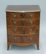 A small early 20th century mahogany bow front chest of drawers. 60 cm wide x 77 cm high.