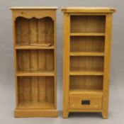 A modern oak bookcase and a modern pine bookcase. The former 56 cm wide x 124 cm high.