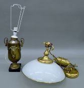 A ceiling light and a brass and copper table lamp. The latter 40 cm high.