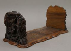 A Victorian carved walnut folding book slide. 38 cm long closed.