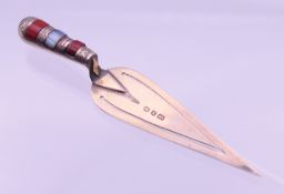 A silver and agate trowel shaped book marker. 8 cm long.