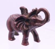 A small bronze elephant. 6 cm high.