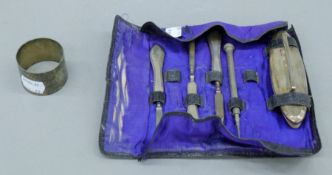 A silver napkin ring and part vanity set and a propelling pencil. The former 3 cm high and 32.