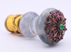 A silver enamel and hardstone cane handle. 10 cm high.