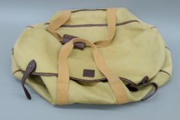 A Swaine Adeney for Lanvin Paris gentlemen's leather-trimmed canvas sports bag. 65 cm long.