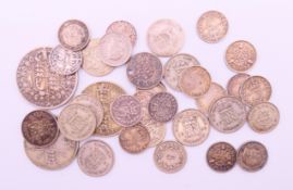 A quantity of Victorian, George V and George VI silver coins, to include sixpences,