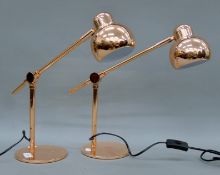 A pair of copper desk lamps. Each 37 cm high.