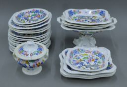 A Victorian porcelain dessert service. The tazza 15 cm high.