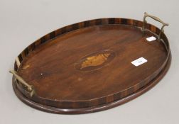 A small Victorian inlaid mahogany tray. 43 cm wide.