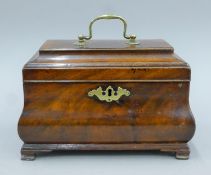 An 18th century mahogany bombe tea caddy. 24.5 cm wide.