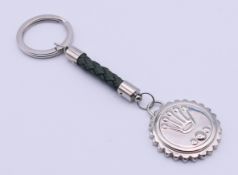 A boxed Rolex 'Baselworld 2016' keyring. 13 cm high.