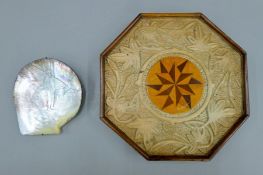 A vintage sailor's Valentine of typical octagonal shape and a carved mother-of-pearl shell