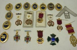 Collection of masonic badges and medals and jewels of various styles and eras