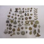 Collection of mostly British military army cap badges, pin badges etc, to incl. Royal Engineers, R.