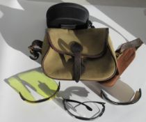 Leather and steel shooting stick, leather cartridge belt, canvas cartridge bag, two shotgun cleaning