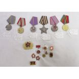 Collection of Russian military medals and badges to incl. Russian medal for Labour distinction,