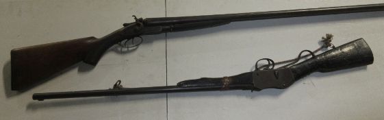 Double barrelled, side by side hammer, double trigger shotgun, lacking makers mark,