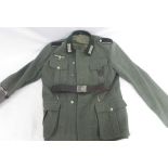 German Army field blouse/tunic with cuff title and wound badge and leather belt Bradleys shipping £