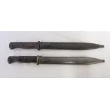 Two WW2 German K98 style bayonets, complete with metal scabbards (numbers not matching), one