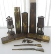Three decorative brass trench art vases, one with 'Libre' and soldier detailing, one '1918 Damascus'