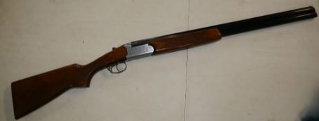 SHOTGUN CERTIFICATE REQUIRED Breda 12 bore over under double trigger shotgun, 27", ejector, length