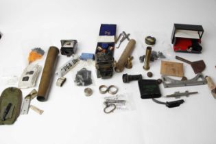 Box of assorted militaria inc. a 4" J.P.W baton round, No. 1 Mk 1 decontamination kit, a 14mm 1954
