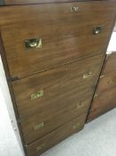 A campaign style brass bound chest of drawers fitt