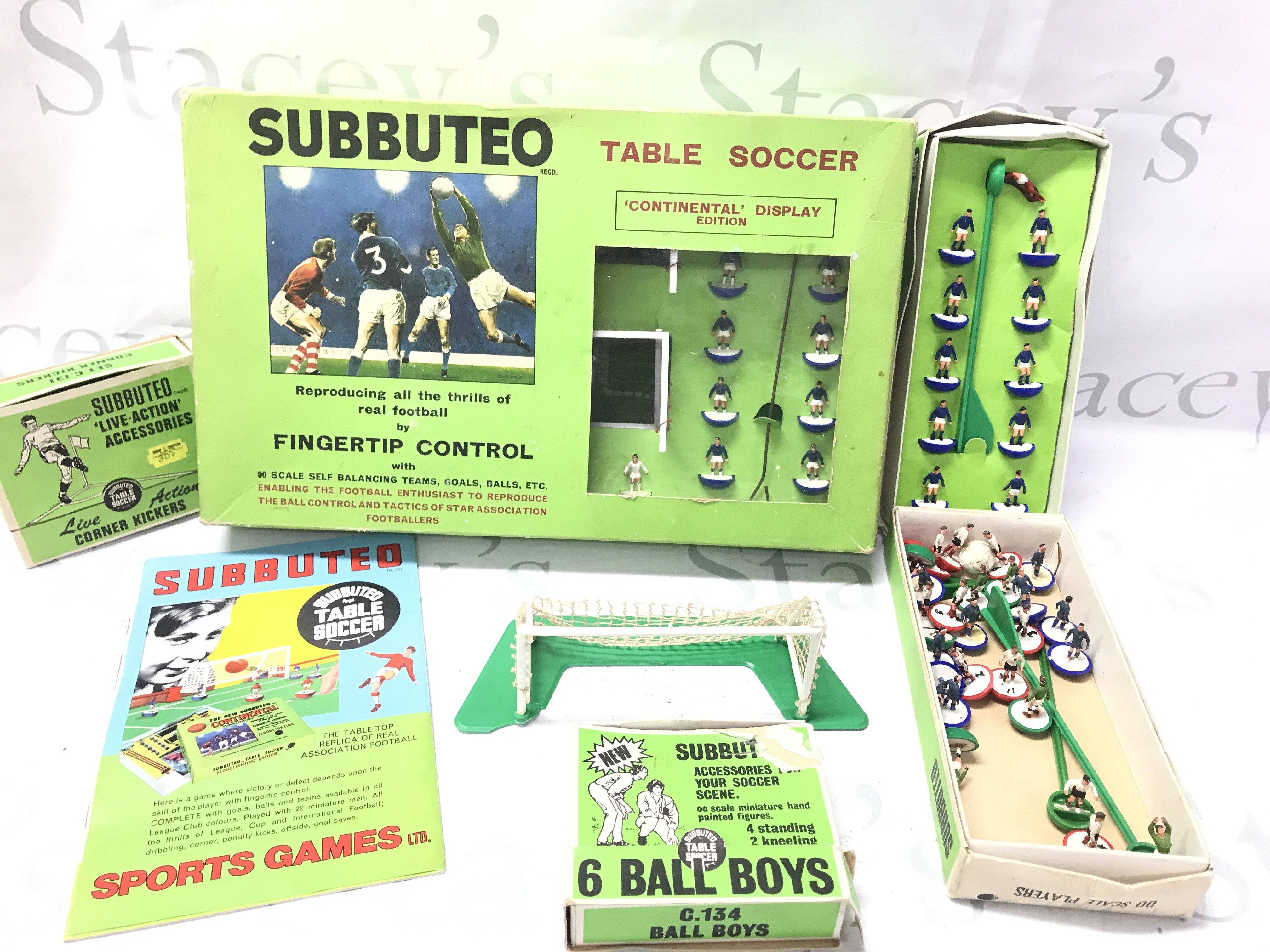A Box Containing Various Subbuteo Sets And Accessories. No Reserve.