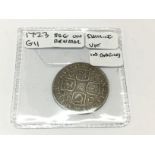 A 1723 GII shilling. Postage A