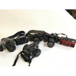 A Collection of vintage cameras including Hanimex,