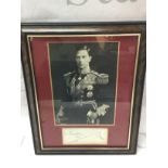 A framed George VI autograph. dimensions 21x27cm