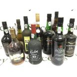 Ten bottles of port and brandy comprising examples