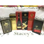 Six bottles of brandy and cognac including Remy Ma