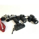 Five vintage cameras including Olympus, Minolta, P