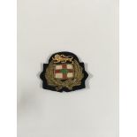 A collection of uniform badges consisting of a lar