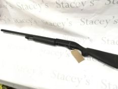 An Escort 12 gauge pump action shotgun. A 25inch M