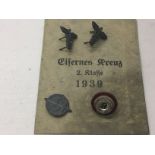 A collection of German Third Reich party badges an