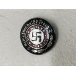A German Third Reich enamel political badge 1933 A