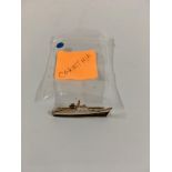 A collection of lapel pin ship badges consisting o