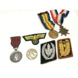 A Collection of medals including a NSDAP German Re