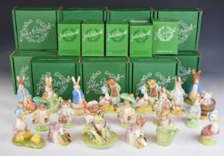 Twenty Beswick Beatrix Potter figures including gold editions, in boxes