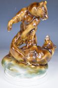 Zsolnay Pecs porcelain figure of fighting bears, signed and dated 1911 verso, H30cm