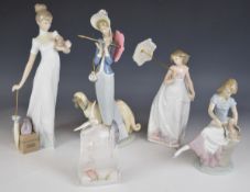 Four Lladro figurines including Best Friend and Stepping Out, and a Lladro Society plaque, tallest