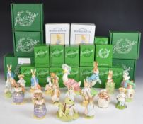 Twenty one Beswick Beatrix Potter figures including gold editions and large size Peter Rabbit and