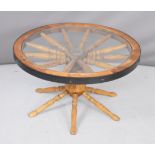 Metal bound cartwheel table with glass top, diameter 74 x height 43cm