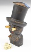 Japanese Kobe toy novelty dice shaker in the form of a gentleman wearing a top hat with pop out bone