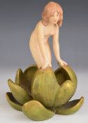 Royal Dux Art Nouveau / Art Deco figurine of a nude nymph emerging from a water lily, H16cm